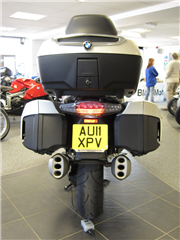 from the rear